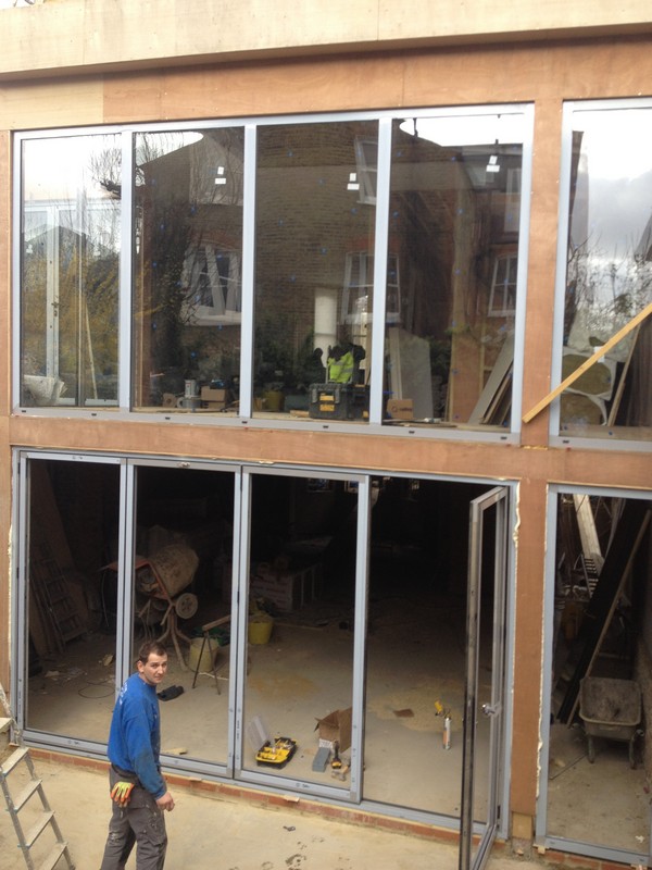 Aluminium bi-fold doors with two-storey glazing in Paddington
